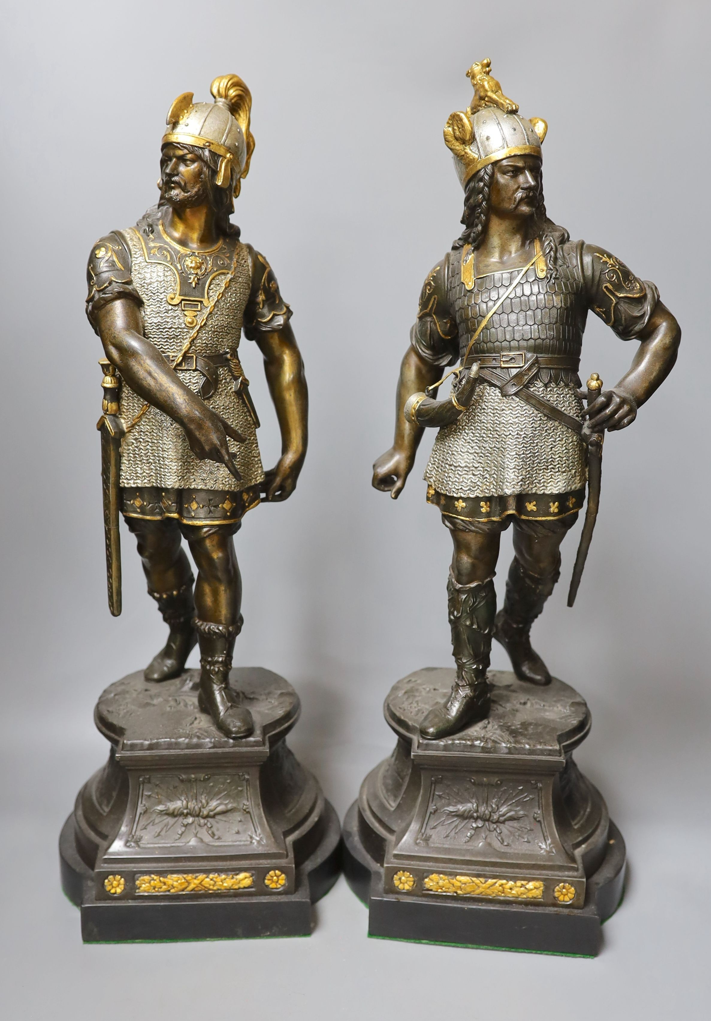 A pair of bronzed spelter gladiator figures - 55cm tall